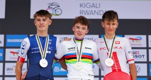 Harry Hudson, Johan Blanc and Jan Michal Jackowiak on the podium of the Men Junior Road Race in Kigali
