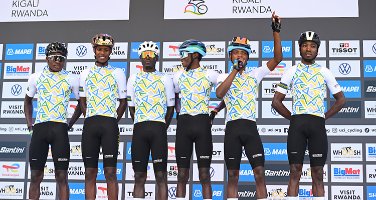 Rwandan riders sengiyumva Shemu, Manizabayo Eric, Muhoza Eric, Masengesho Vainqueur, Byukusenge Patrick, and Nkundabera Eric greeting the crowd before the start of the Men Elite Road Race in Kigali